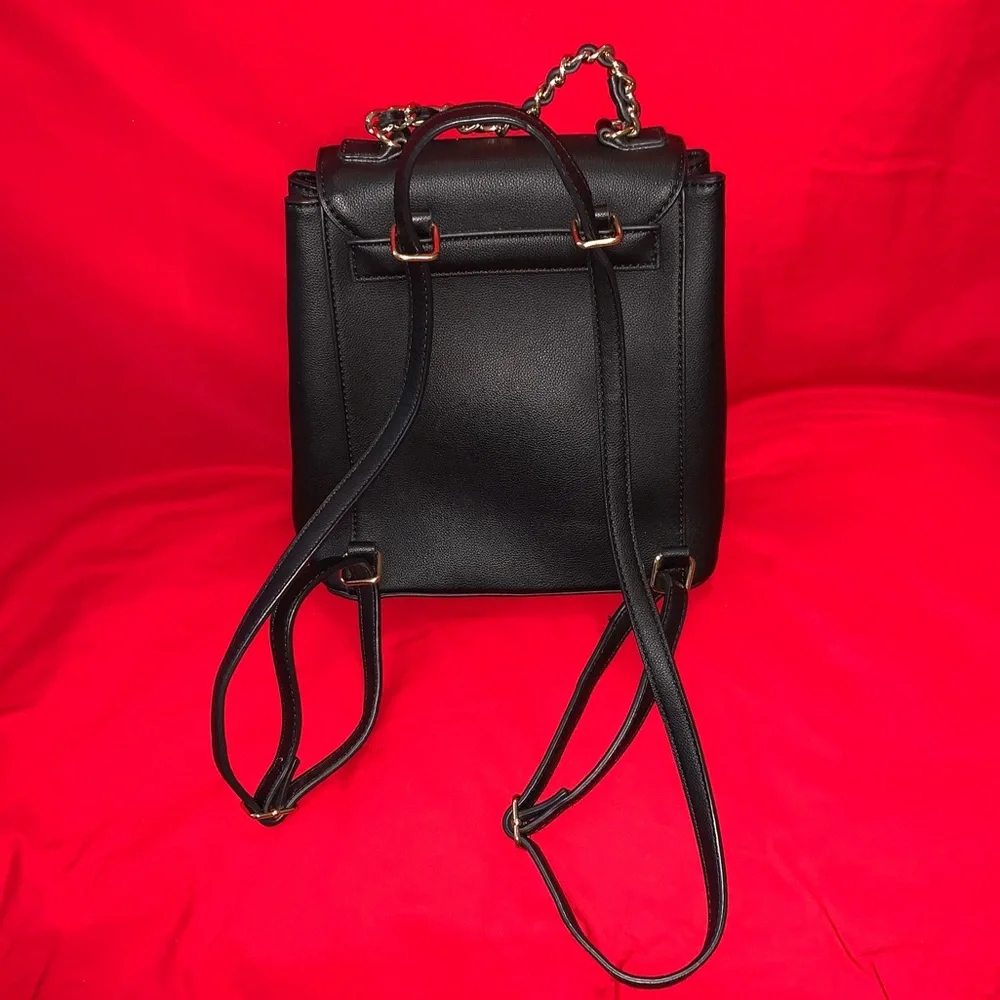 GUESS Quilted Backpack with convertible straps. - Picture 2 of 6